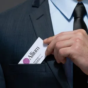 Man putting business card in to breast pocket